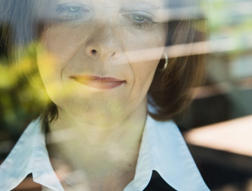 Portrait of business woman reading SMS Portrait of business woman reading SMS